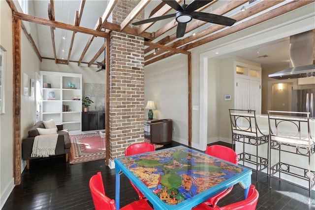7715 Panola St, New Orleans, LA 70118 - dining room featuring a ceiling fan, baseboards, and wood-type flooring