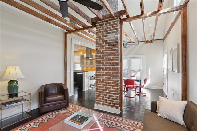 7715 Panola St, New Orleans, LA 70118 - living room featuring ceiling fan, baseboards, beam ceiling, and wood finished floors