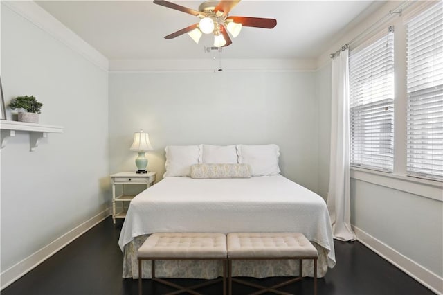 7715 Panola St, New Orleans, LA 70118 - bedroom with baseboards, ceiling fan, and wood finished floors
