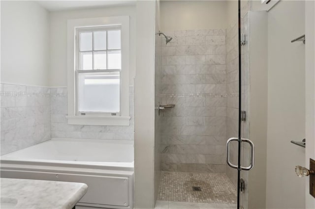 7715 Panola St, New Orleans, LA 70118 - full bathroom with a bath, a shower stall, and plenty of natural light
