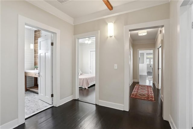 7715 Panola St, New Orleans, LA 70118 - hallway with dark wood-type flooring, ornamental molding, and baseboards
