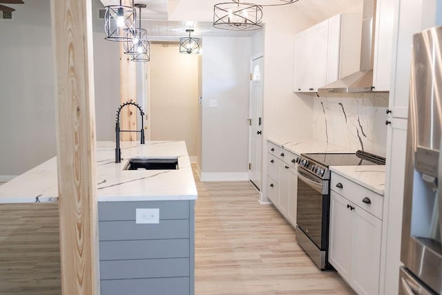 114WCHAMALECOVE W Chamale Cv, Slidell, LA 70460 - kitchen with appliances with stainless steel finishes, a sink, light stone countertops, and light wood-style flooring