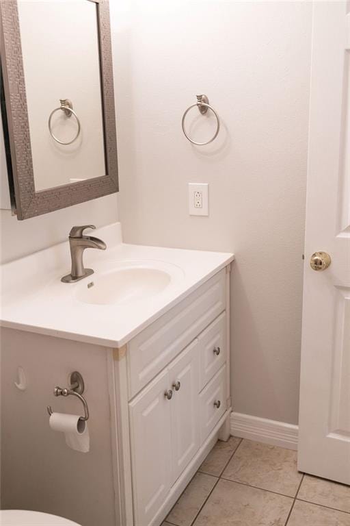 114WCHAMALECOVE W Chamale Cv, Slidell, LA 70460 - half bath with vanity, tile patterned floors, baseboards, and toilet