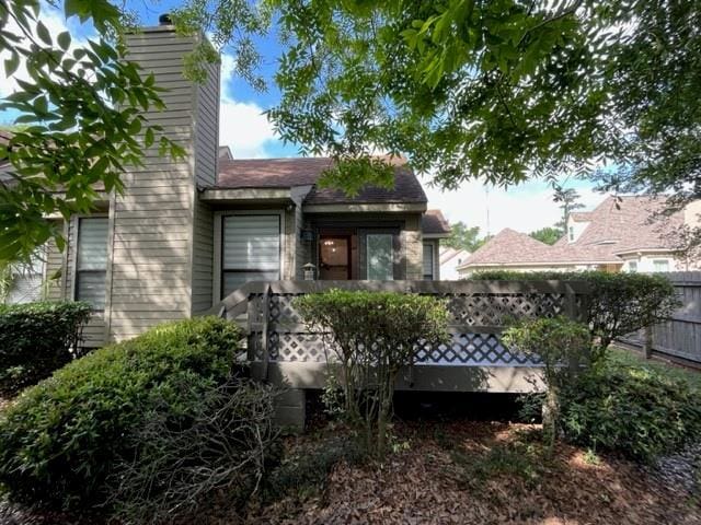 114WCHAMALECOVE W Chamale Cv, Slidell, LA 70460 - rear view of house with fence and a wooden deck