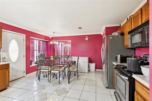 2929 Hudson St, New Orleans, LA 70114 - dining area with a textured ceiling, ornamental molding, light tile patterned floors, baseboards, and a chandelier