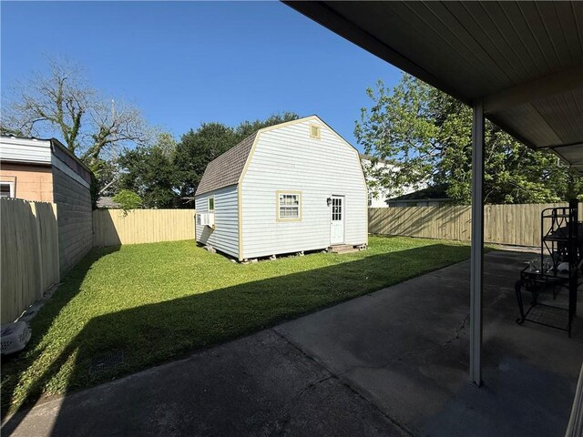 2820 Annette St, New Orleans, LA 70119 - view of yard with a patio area, an outbuilding, and a storage unit