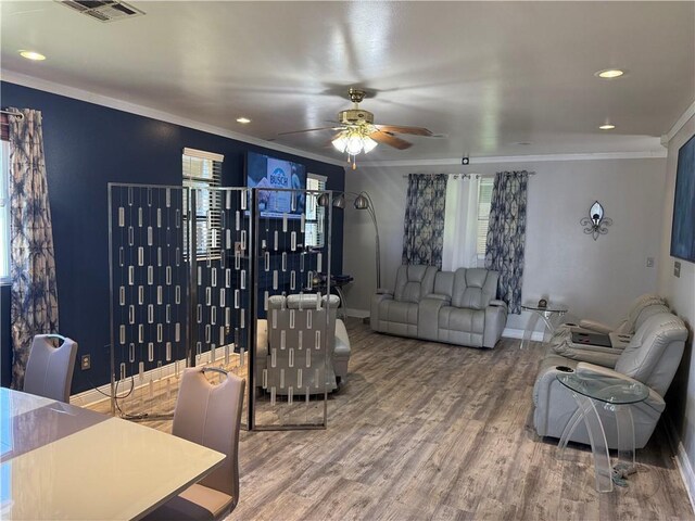 2820 Annette St, New Orleans, LA 70119 - living room featuring ornamental molding, a ceiling fan, wood finished floors, baseboards, and recessed lighting