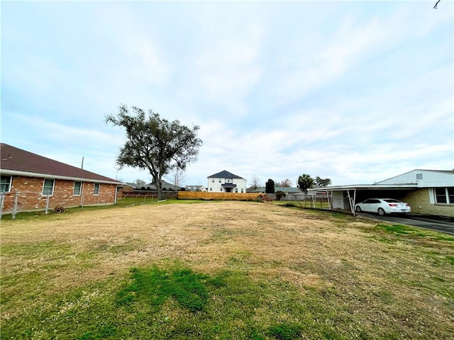 5311 Bancroft Dr, New Orleans, LA 70122 - view of yard with a carport