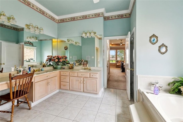 10 Harbor Cv, Slidell, LA 70458 - full bath featuring ornamental molding, tile patterned floors, a bath, double vanity, and a high ceiling