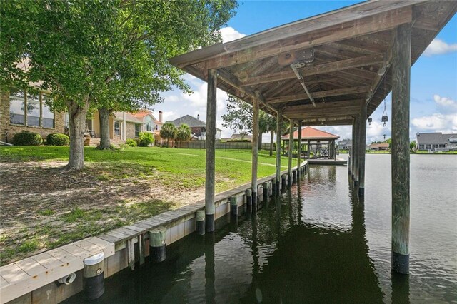 10 Harbor Cv, Slidell, LA 70458 - dock featuring a gazebo, a water view, and a lawn