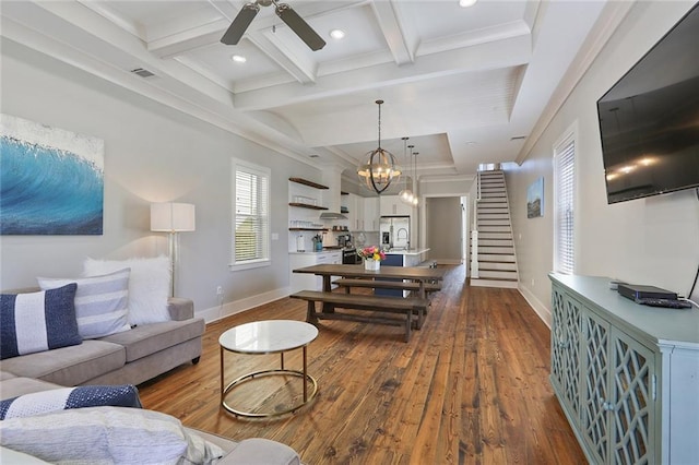 1631 Baronne St, New Orleans, LA 70113 - living room with a ceiling fan, dark wood-style flooring, beamed ceiling, coffered ceiling, and stairway