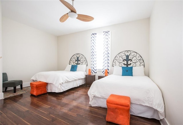 1241 Kerlerec St, New Orleans, LA 70116 - bedroom with wood finished floors, ceiling fan, and baseboards