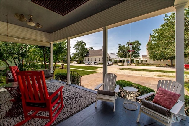 245 E Oak St, Ponchatoula, LA 70454 - view of patio / terrace with a porch