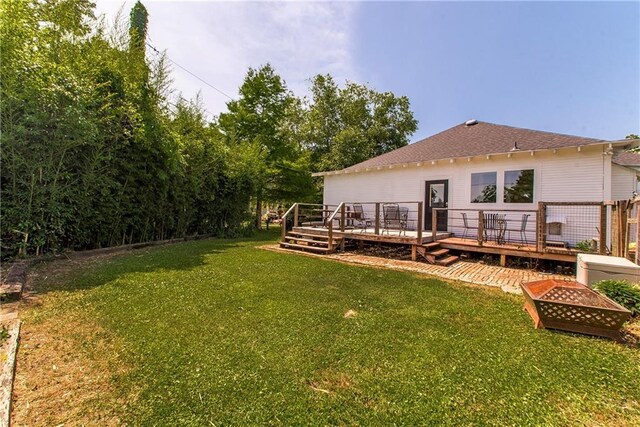 245 E Oak St, Ponchatoula, LA 70454 - view of green lawn with a deck