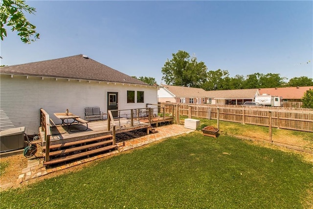 245 E Oak St, Ponchatoula, LA 70454 - rear view of house featuring a wooden deck and a shingled roof