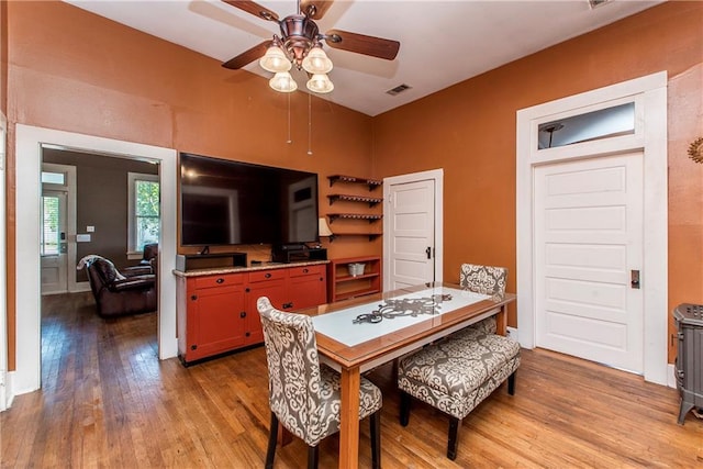 245 E Oak St, Ponchatoula, LA 70454 - dining room featuring light wood-type flooring and a ceiling fan