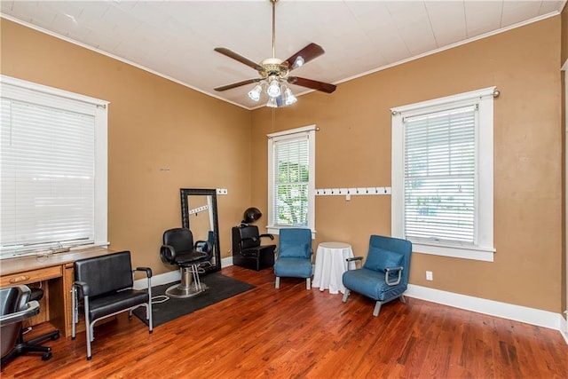 245 E Oak St, Ponchatoula, LA 70454 - living area featuring crown molding, a ceiling fan, wood finished floors, and baseboards