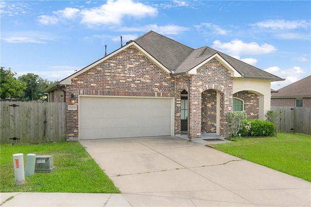 view of front of house with brick siding, a garage, concrete driveway, and roof with shingles