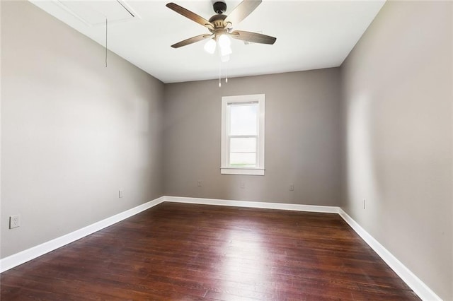 316 Milling Ave, Luling, LA 70070 - empty room with attic access, dark wood-type flooring, baseboards, and ceiling fan