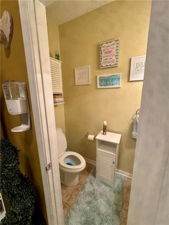 2132 Wellington Ln, Slidell, LA 70461 - bathroom with tile patterned flooring and toilet