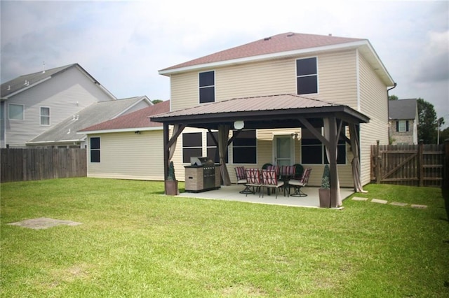 2132 Wellington Ln, Slidell, LA 70461 - rear view of property with a gazebo and a patio