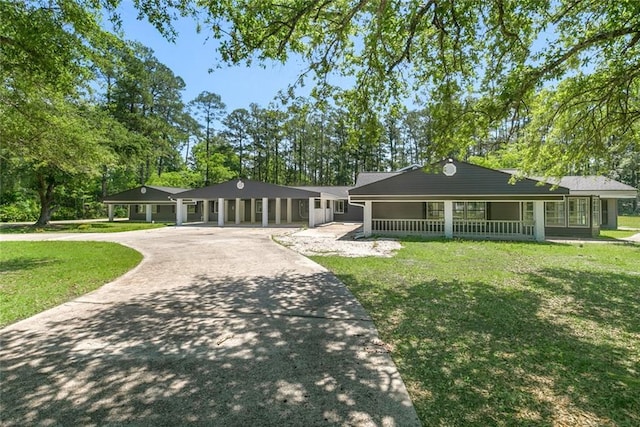 60078 W Park Cir, Lacombe, LA 70445 - view of property's community with a yard and concrete driveway