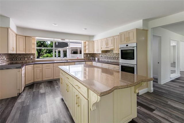 60078 W Park Cir, Lacombe, LA 70445 - kitchen with white appliances, open shelves, a kitchen island, dark wood-style flooring, and recessed lighting