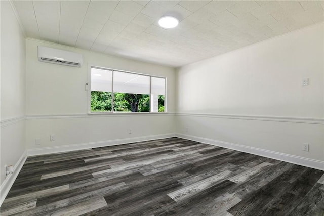 60078 W Park Cir, Lacombe, LA 70445 - spare room with a wall mounted AC, dark wood finished floors, and baseboards