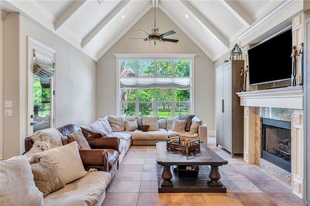 11 Arbor Cir, New Orleans, LA 70131 - living area with a high ceiling, beam ceiling, ceiling fan, plenty of natural light, and a fireplace