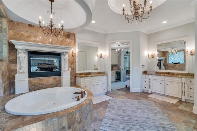 11 Arbor Cir, New Orleans, LA 70131 - full bathroom with a chandelier, a jetted tub, crown molding, vanity, and recessed lighting