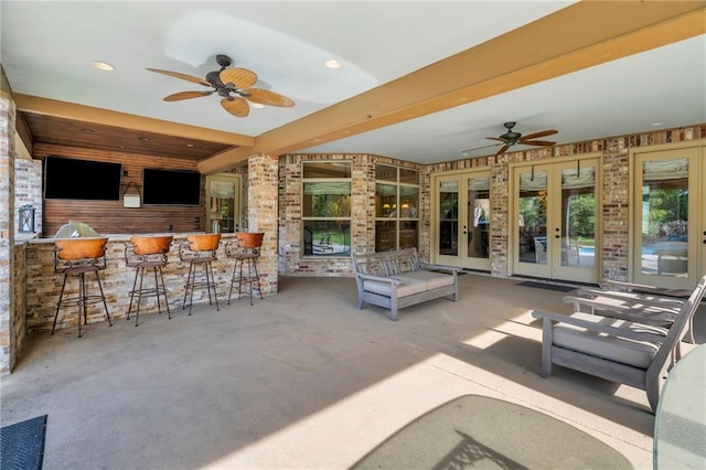 11 Arbor Cir, New Orleans, LA 70131 - view of patio / terrace with french doors, a ceiling fan, and a bar