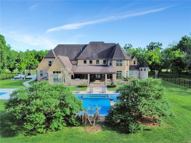 11 Arbor Cir, New Orleans, LA 70131 - back of property featuring stone siding and board and batten siding