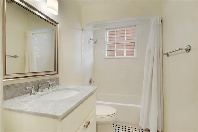 912 Spain St, New Orleans, LA 70117 - full bathroom with vanity, toilet, shower / bathtub combination with curtain, and tile patterned flooring
