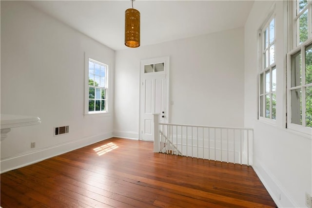 912 Spain St, New Orleans, LA 70117 - spare room with hardwood / wood-style floors and baseboards