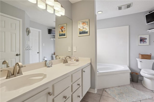 full bath with toilet, tile patterned flooring, a bath, and double vanity