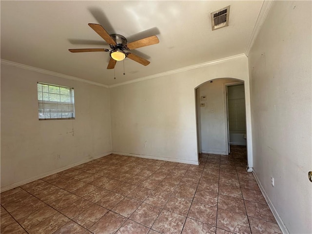 3855 Metropolitan St, New Orleans, LA 70126 - empty room featuring arched walkways, ceiling fan, ornamental molding, and baseboards