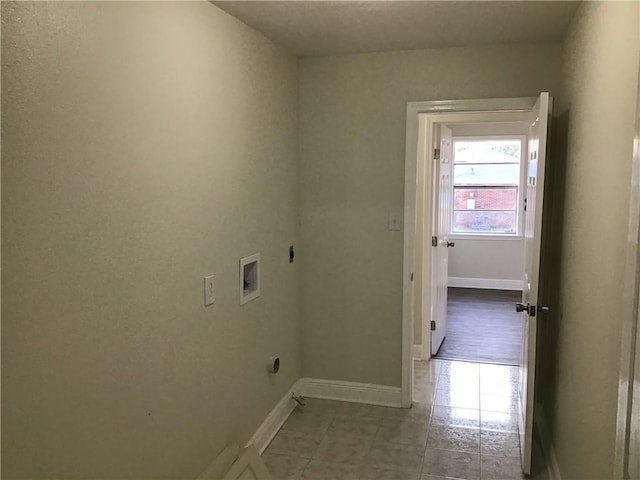 564 Oakwood Dr, Gretna, LA 70056 - laundry room featuring washer hookup, hookup for an electric dryer, tile patterned flooring, and baseboards