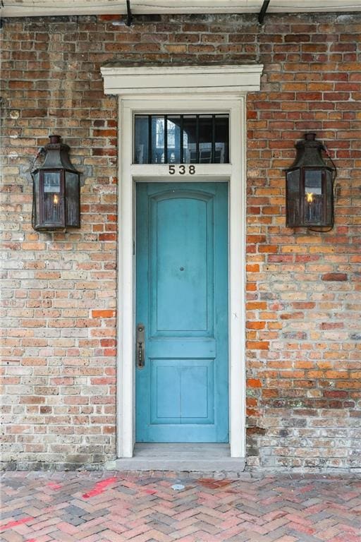 538 Governor Nicholls St, New Orleans, LA 70116 - property entrance with brick siding