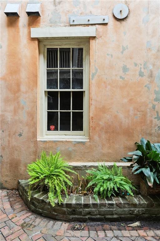 538 Governor Nicholls St, New Orleans, LA 70116 - exterior view of stucco siding