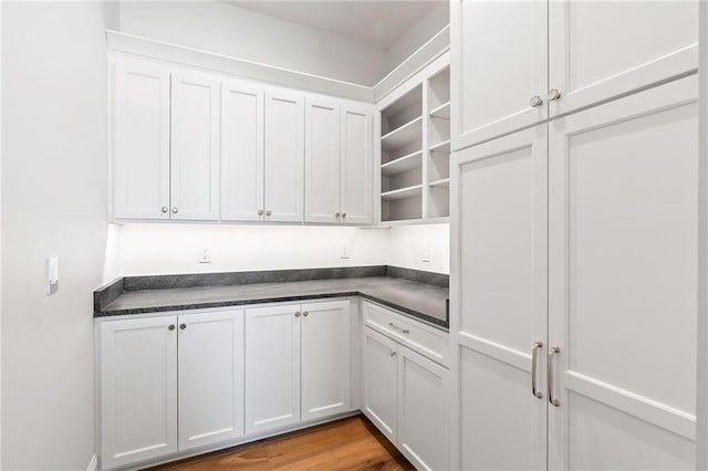 136 Linnette Ln, Mandeville, LA 70471 - kitchen with dark countertops, white cabinetry, and open shelves