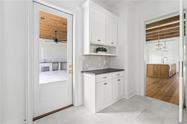 136 Linnette Ln, Mandeville, LA 70471 - entryway with ceiling fan, a sink, and beamed ceiling