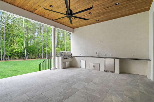 136 Linnette Ln, Mandeville, LA 70471 - view of patio with exterior kitchen, grilling area, a ceiling fan, and a sink