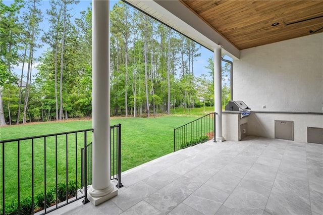 136 Linnette Ln, Mandeville, LA 70471 - view of patio / terrace featuring view of scattered trees and a grill