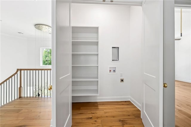 136 Linnette Ln, Mandeville, LA 70471 - washroom featuring electric dryer hookup, wood finished floors, hookup for a washing machine, baseboards, and crown molding