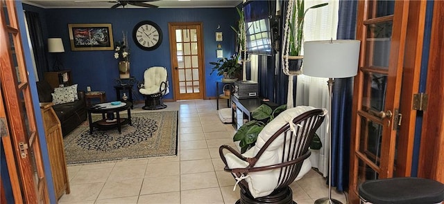 3231 47th St, Metairie, LA 70001 - living area with tile patterned floors and a ceiling fan