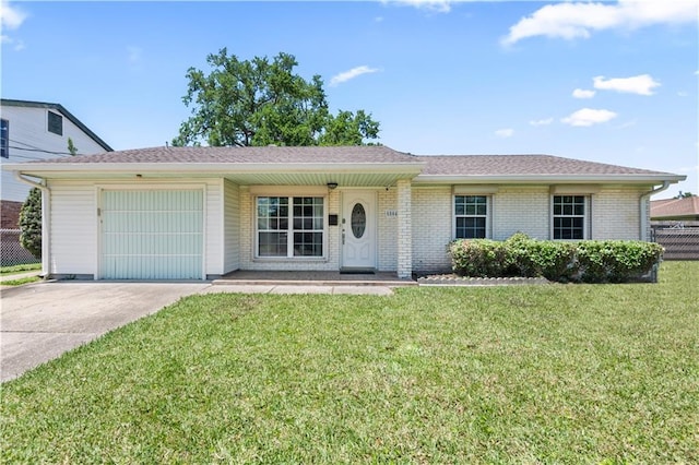 5504 Sabine Dr, Marrero, LA 70072 - ranch-style home with concrete driveway, a garage, and brick siding