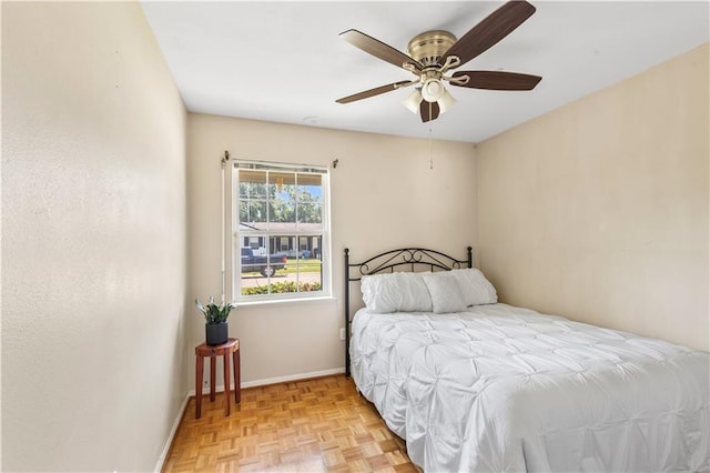 5504 Sabine Dr, Marrero, LA 70072 - bedroom featuring baseboards and a ceiling fan