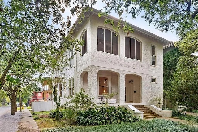 8-10 Neron Pl, New Orleans, LA 70118 - view of front facade with stucco siding