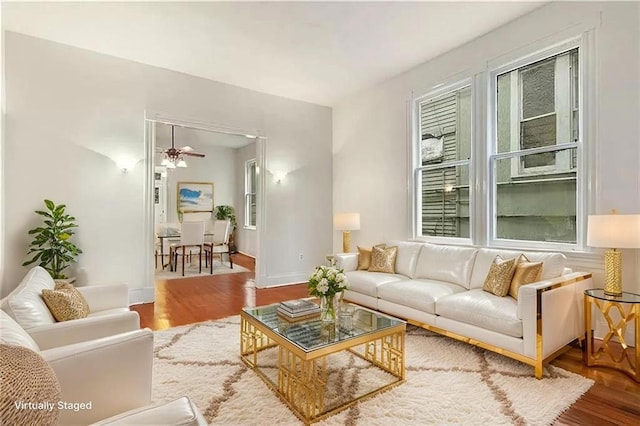 8-10 Neron Pl, New Orleans, LA 70118 - living room with wood finished floors and ceiling fan
