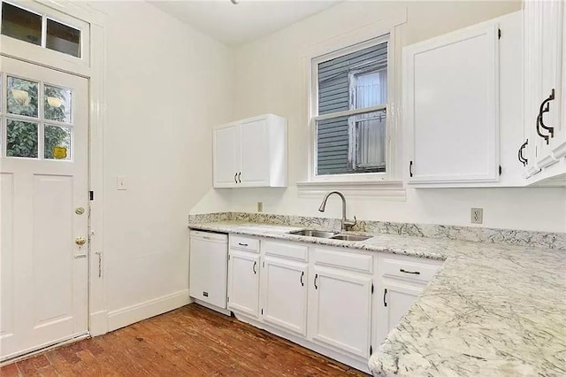 8-10 Neron Pl, New Orleans, LA 70118 - kitchen featuring dishwasher, wood finished floors, white cabinets, and light stone counters